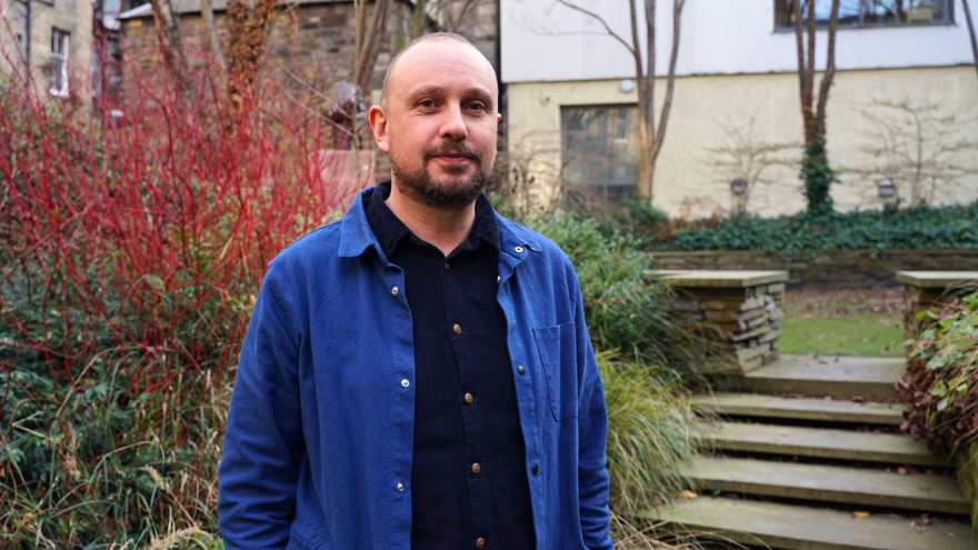Imge of Daniel Abercrombie standing in Sandeman House Garden